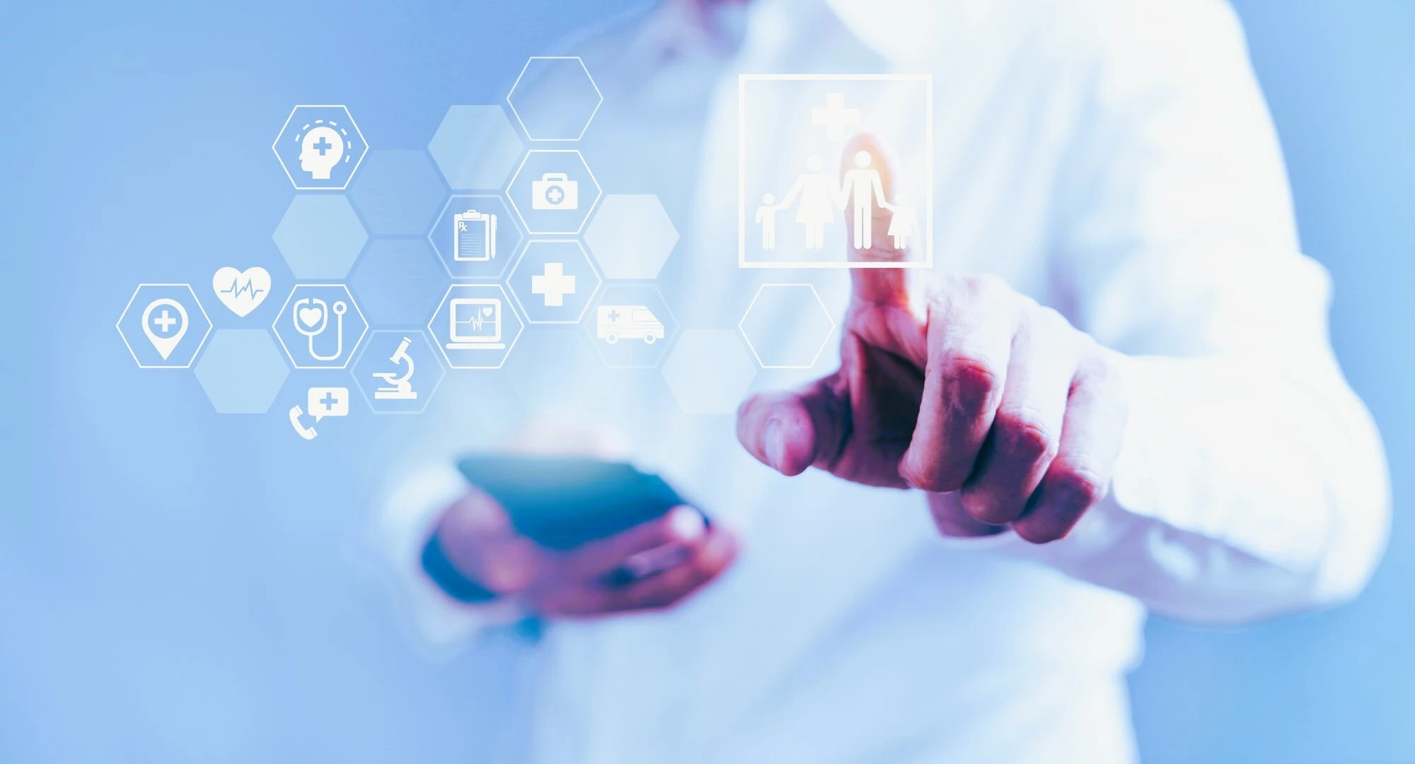 Photo of a doctor holding a mobile diagnostic device